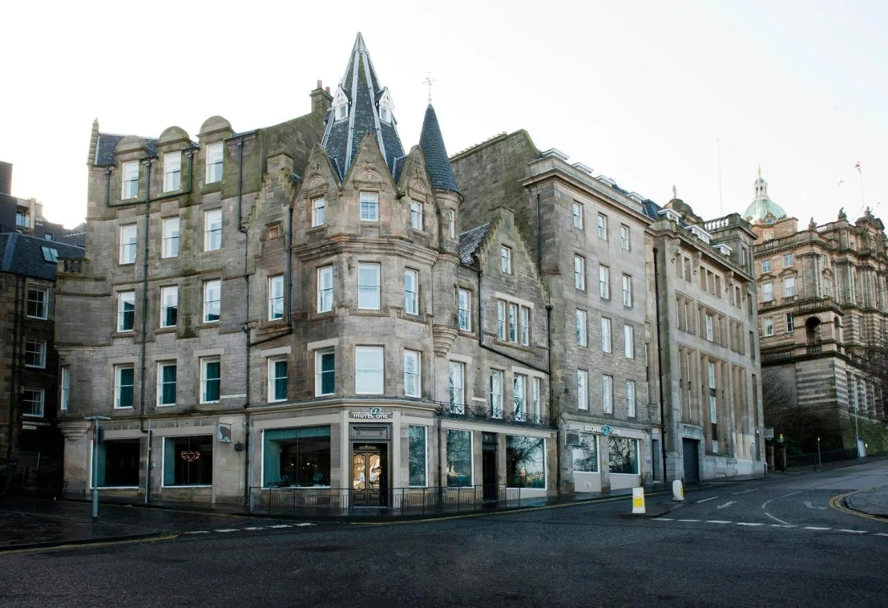 an old building on a street in a city at Motel One Edinburgh-Royal in Edinburgh